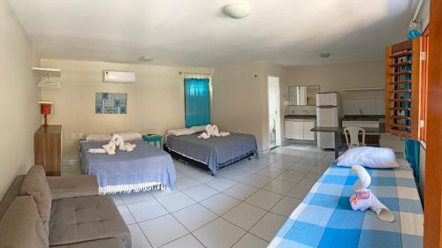 Katil atau katil-katil dalam bilik di Porto Seguro Flat