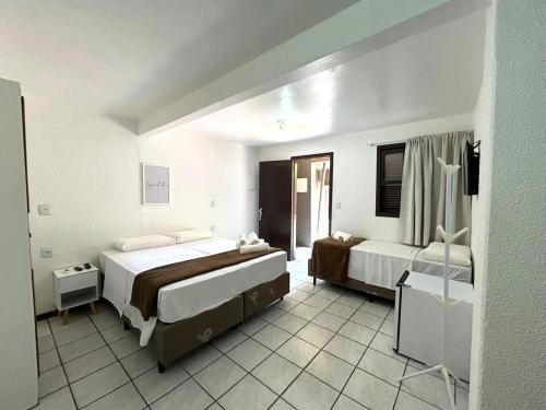 Una cama o camas en una habitación de Anexos De Rose