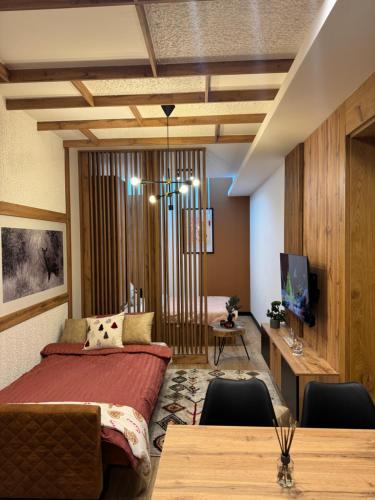 Postel nebo postele na pokoji v ubytování Winter Park Idila apartments