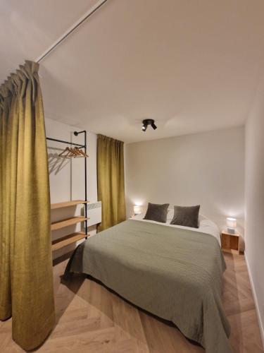 Ένα ή περισσότερα κρεβάτια σε δωμάτιο στο Durbuy Horizon