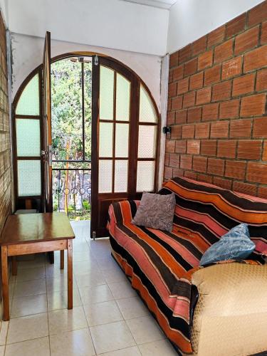 Χώρος καθιστικού στο Hostal Margaritas - Torotoro