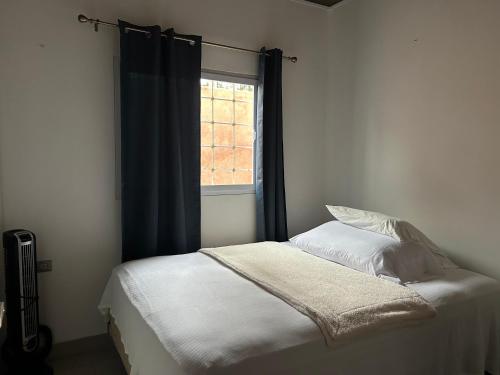 Postel nebo postele na pokoji v ubytování La casa de la H, entre pinos