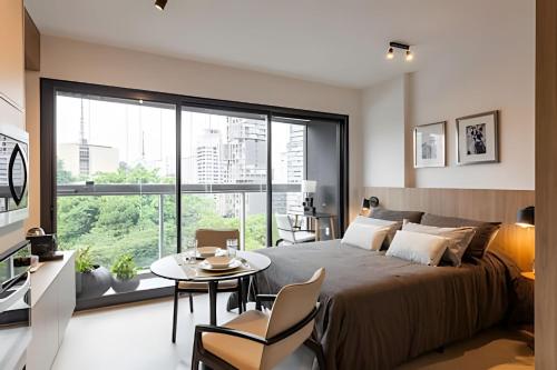 Postel nebo postele na pokoji v ubytování Arvo luxury Studio Rebouças C115