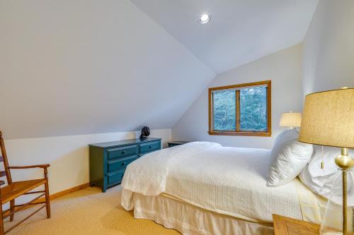 a bedroom with a bed and a chair and a window at Spacious Dover Refuge about 5 Mi to Mount Snow! in Dover