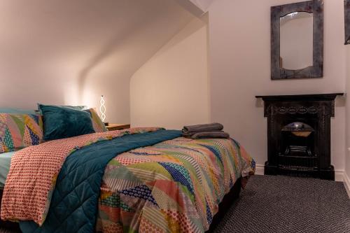 Ένα ή περισσότερα κρεβάτια σε δωμάτιο στο Lodging In Carrickfergus Centre