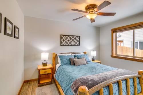 a bedroom with a bed and a ceiling fan at Cozy Belgrade Home Near Skiing, Hiking and Airport! in Belgrade