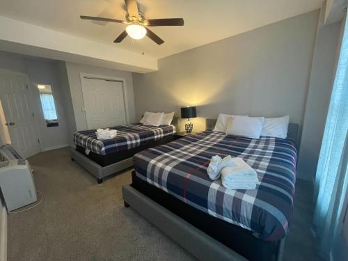 Ένα ή περισσότερα κρεβάτια σε δωμάτιο στο Northridge Retreat