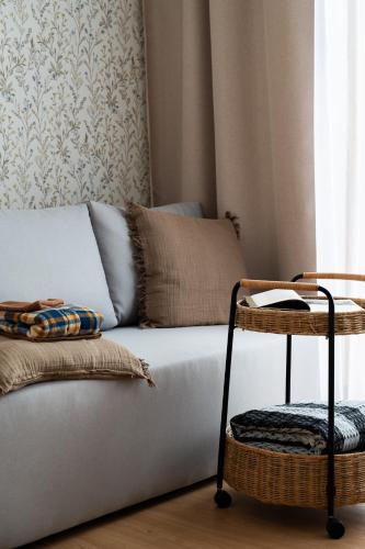 a living room with a couch and a table at Panocek i Babka in Białka Tatrzanska