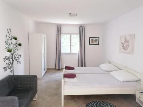 Postel nebo postele na pokoji v ubytování Apartment Petar