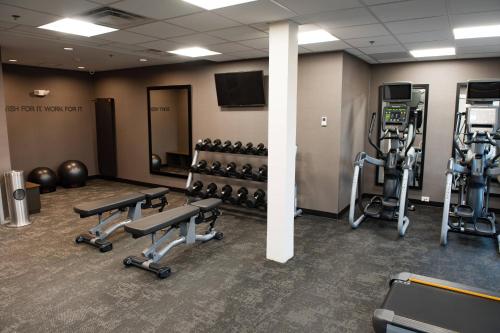 a gym with dumbbells and weights in a room at Fairfield Inn & Suites by Marriott Anderson in Anderson