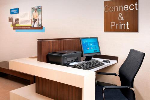 an office with a desk with a computer and a printer at Fairfield Inn & Suites by Marriott Albany East Greenbush in East Greenbush