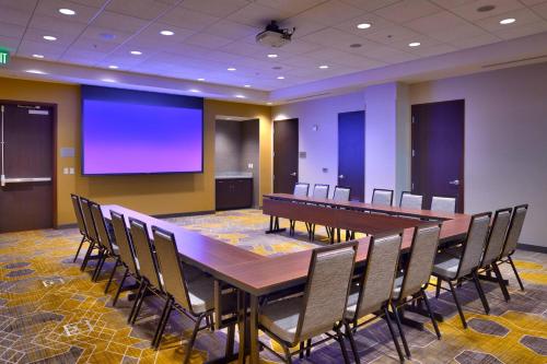 a conference room with a long table and chairs at Courtyard by Marriott Salt Lake City Downtown in Salt Lake City