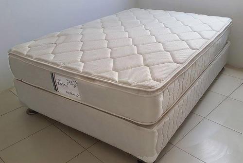 a white mattress sitting on the floor in a room at MAGICPERU BaCKPACKERS in Trujillo