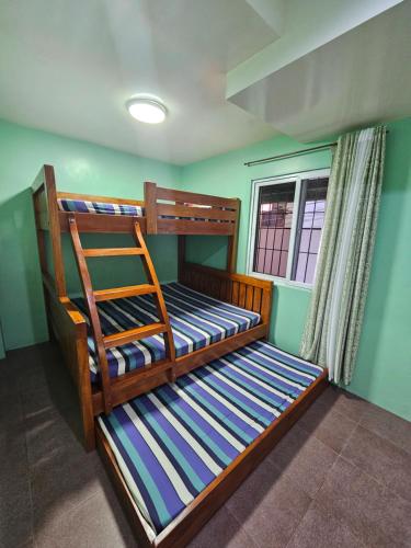 Postel nebo postele na pokoji v ubytování MF Apartments