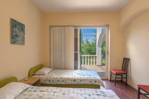 Postel nebo postele na pokoji v ubytování Apartments by the sea Ljubac, Zadar - 14593