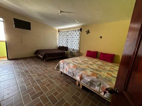 Postel nebo postele na pokoji v ubytování Casa Alixel Hotel Boutique