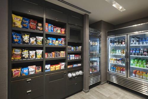 a walk in pantry filled with lots of food and drinks at Courtyard St. Louis Brentwood in Richmond Heights