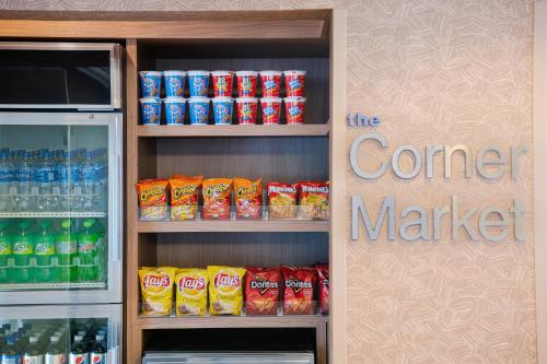 a store refrigerator filled with lots of soft drinks at Fairfield Inn & Suites by Marriott Chicago Naperville in Naperville