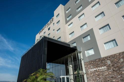a rendering of the front of a hotel at Courtyard by Marriott San Luis Potosi, Los Lagos in San Luis Potosí