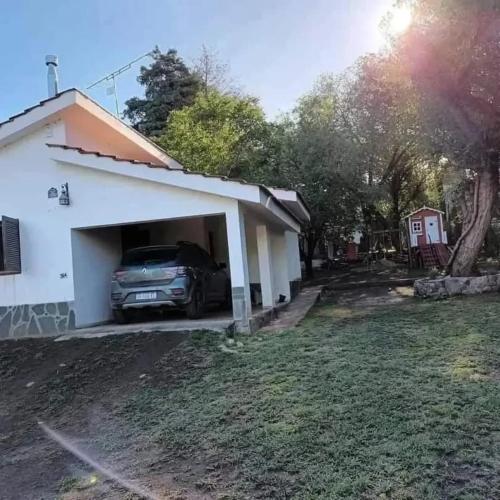 a car parked inside of a garage at Chalet los aromos in Villa Los Aromos