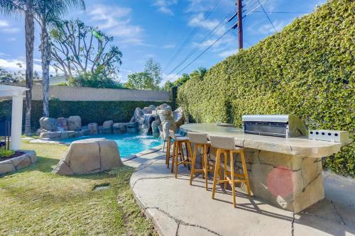 a backyard with a table and chairs and a pool at Destination #48 in Placentia