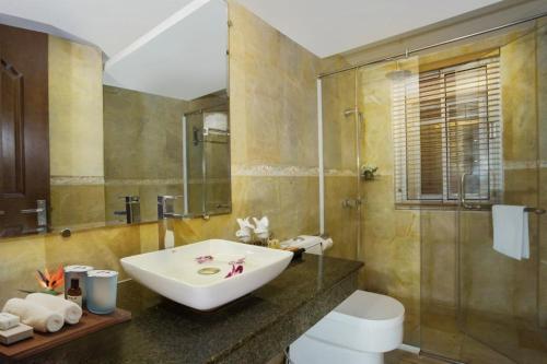 a bathroom with a sink and a toilet at Classic Street Hotel in Hanoi