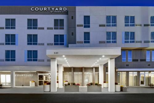 a rendering of the front of a building at Courtyard by Marriott Hamilton in Hamilton