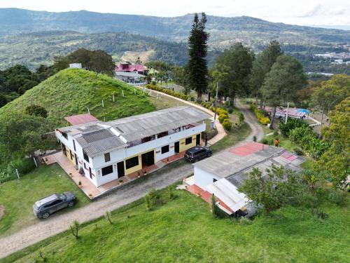 an aerial view of a house on a hill at Cabaña Campestre San Nicolas in Moniquirá