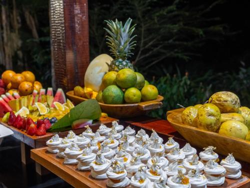 a display of fruits and vegetables on a table at Tambopata Research Center in Tambopata
