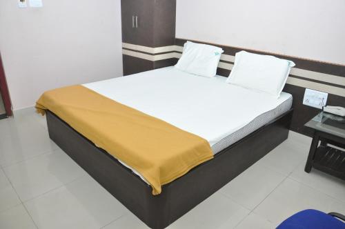 Postel nebo postele na pokoji v ubytování SSR Hotel