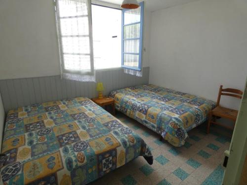 Postel nebo postele na pokoji v ubytování Appartement RDC à 100m plage, animaux admis, stationnement facile - FR-1-540-304