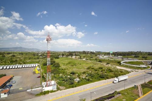 an aerial view of a highway with a tower at Fairfield Inn & Suites Silao Guanajuato Airport in Silao
