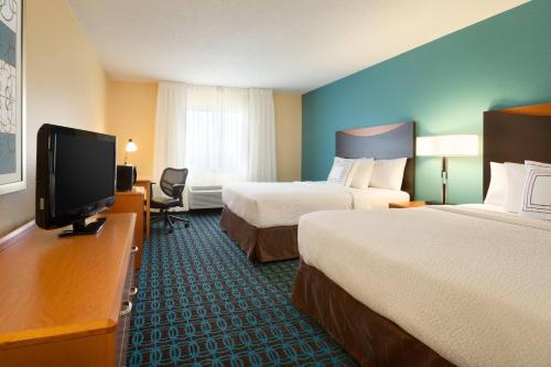 Katil atau katil-katil dalam bilik di Country Inn & Suites by Radisson, Bismarck-Mandan