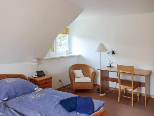 Ένα ή περισσότερα κρεβάτια σε δωμάτιο στο Dat Müggenhus in Wieck