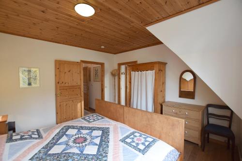 Postel nebo postele na pokoji v ubytování Ferienhaus Zaunkönig