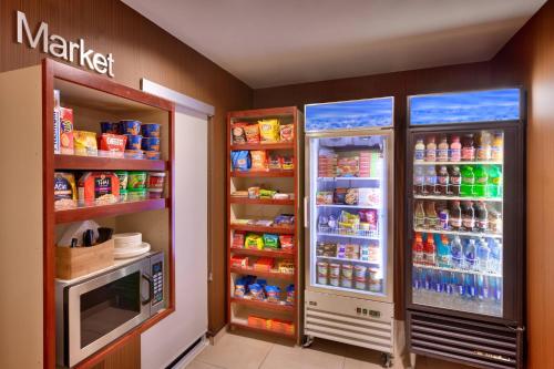 a store with two refrigerators in a room at Fairfield Inn & Suites Boise Nampa in Nampa
