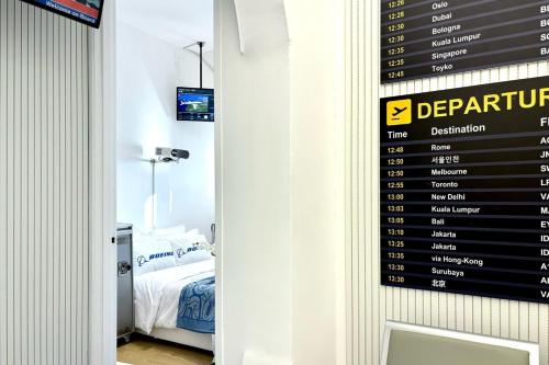 Postel nebo postele na pokoji v ubytování Dooga Ins-Boeing 737 Seaview