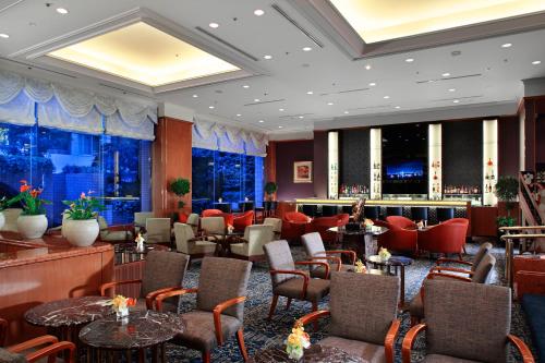 Χώρος καθιστικού στο Royal Park Hotel