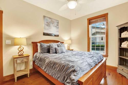 a bedroom with a bed and a window at Family Friendly Cottage 9 Logan in Tybee Island