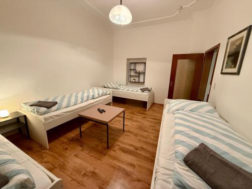 Ένα ή περισσότερα κρεβάτια σε δωμάτιο στο Wu Flats