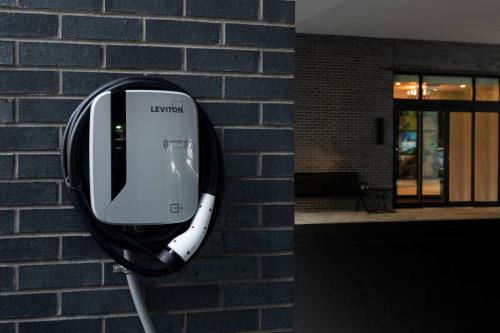 a phone on the side of a brick wall at Fairfield by Marriott Inn & Suites Boston Medford in Medford
