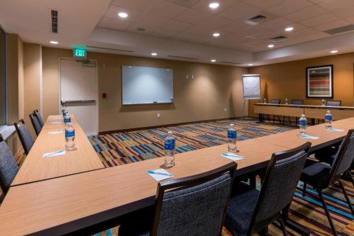 a conference room with a long table and chairs at Fairfield Inn & Suites by Marriott Boston Marlborough/Apex Center in Marlborough