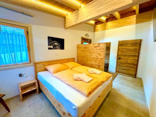 Postel nebo postele na pokoji v ubytování Landhaus Riesneralm