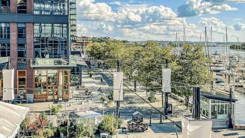 a view of a city with a marina and buildings at Monthier The Wharf BLW9S5U7-2 in Washington, D.C.