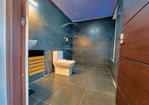 Koupelna v ubytování Irish County Vagamon Pool Resort by VOYE HOMES