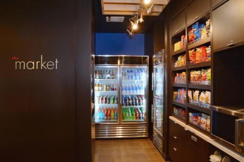 a large refrigerator filled with lots of drinks at Courtyard by Marriott Youngstown Canfield in Canfield