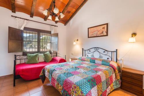 Giường trong phòng chung tại Finca Liarte