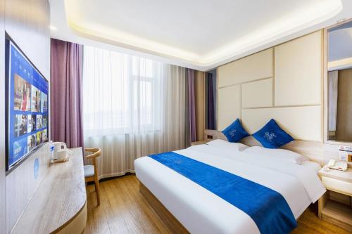 Postel nebo postele na pokoji v ubytování Lida Hotel