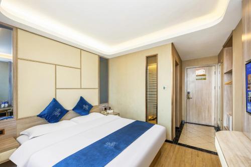 Postel nebo postele na pokoji v ubytování Lida Hotel
