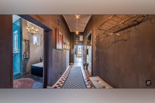 Ένα ή περισσότερα κρεβάτια σε δωμάτιο στο Apartment gallery